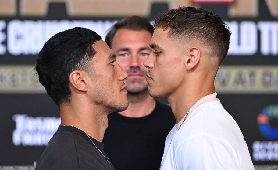 Jai Opetaia (left) and David Nyika face off in front of Eddie Hearn Imago