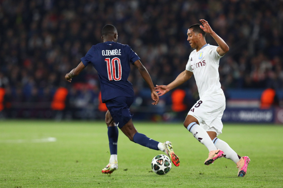 IMAGO PSG forward Ousmane Dembele and Aston Villa midfielder Youri Tielemans in action in the Champions League quarter final first leg
