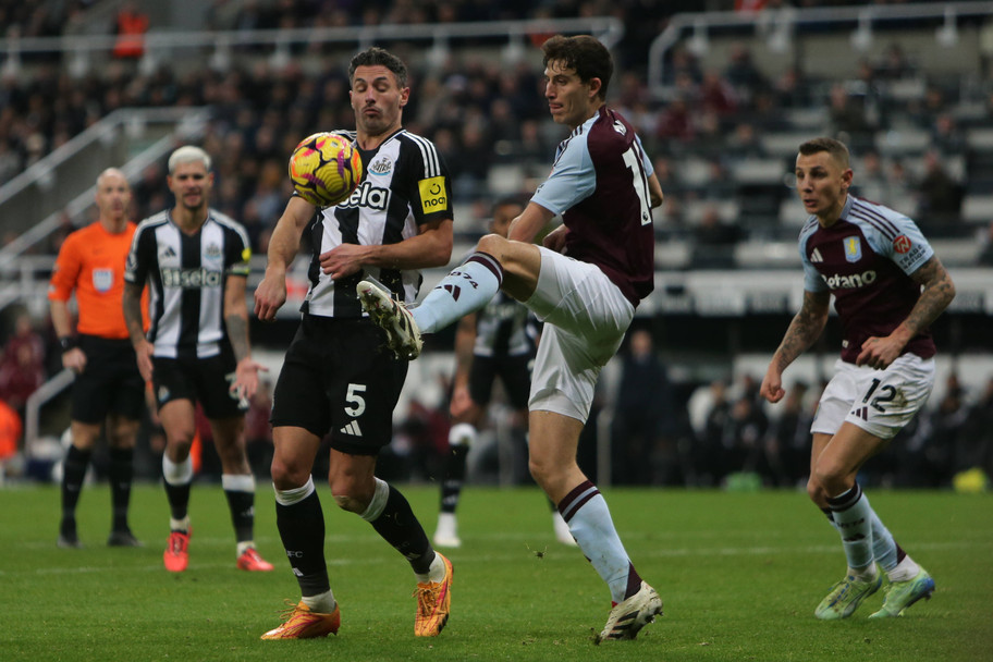 IMAGO Newcastle defender Fabian Schar clashes with Aston Villa man Pau Torres