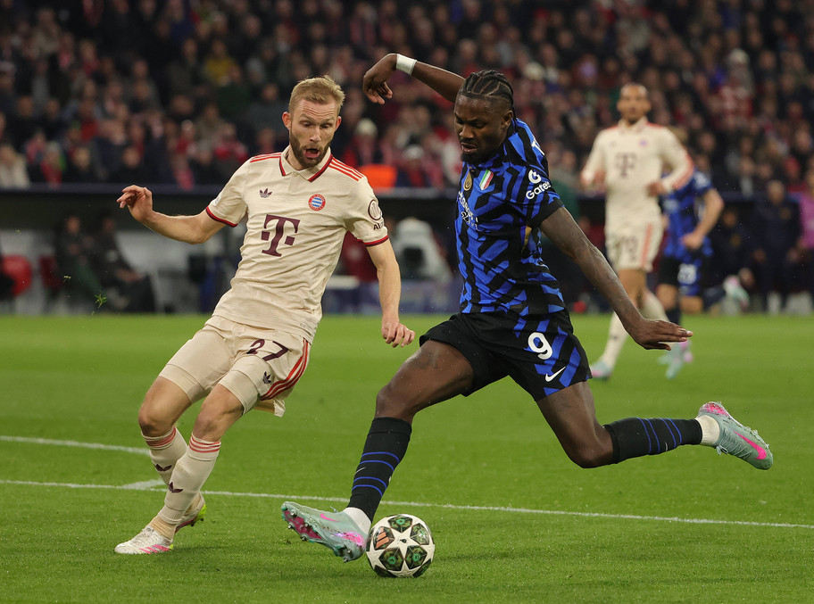 IMAGO Marcus Thuram in action against Bayern Munich midfielder Konrad Laimer in the Champions League last week
