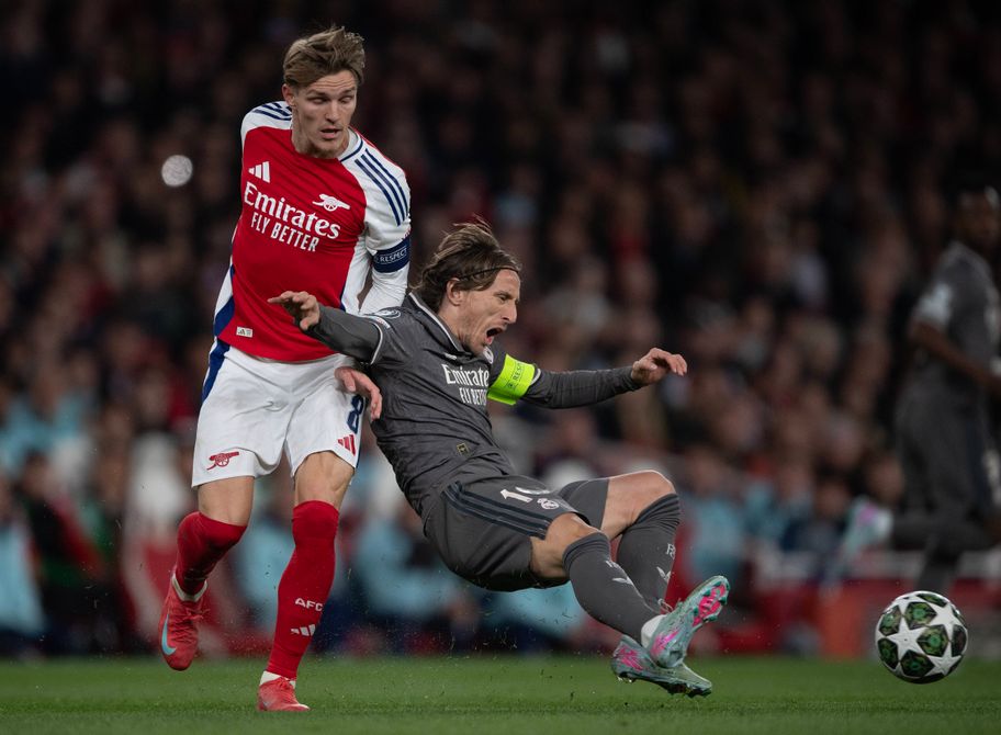 IMAGO - Arsenal's Martin Odegaard and Real Madrid's Luka Modric battle for possession